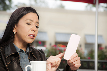 Lady looking at her Phone